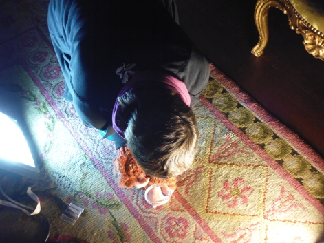 Kate checking the Drawing Room carpet for pests at Osterley Park (image: Laura Brooks)